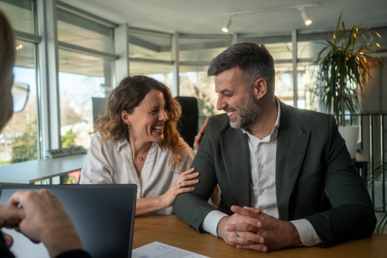 Couple discussing prenuptial financial agreement with family lawyer in NSW
