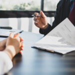 Executor meeting with estate lawyer to manage probate process in NSW