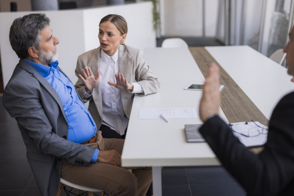 Separated couple discussing family law dispute options after mediation in NSW