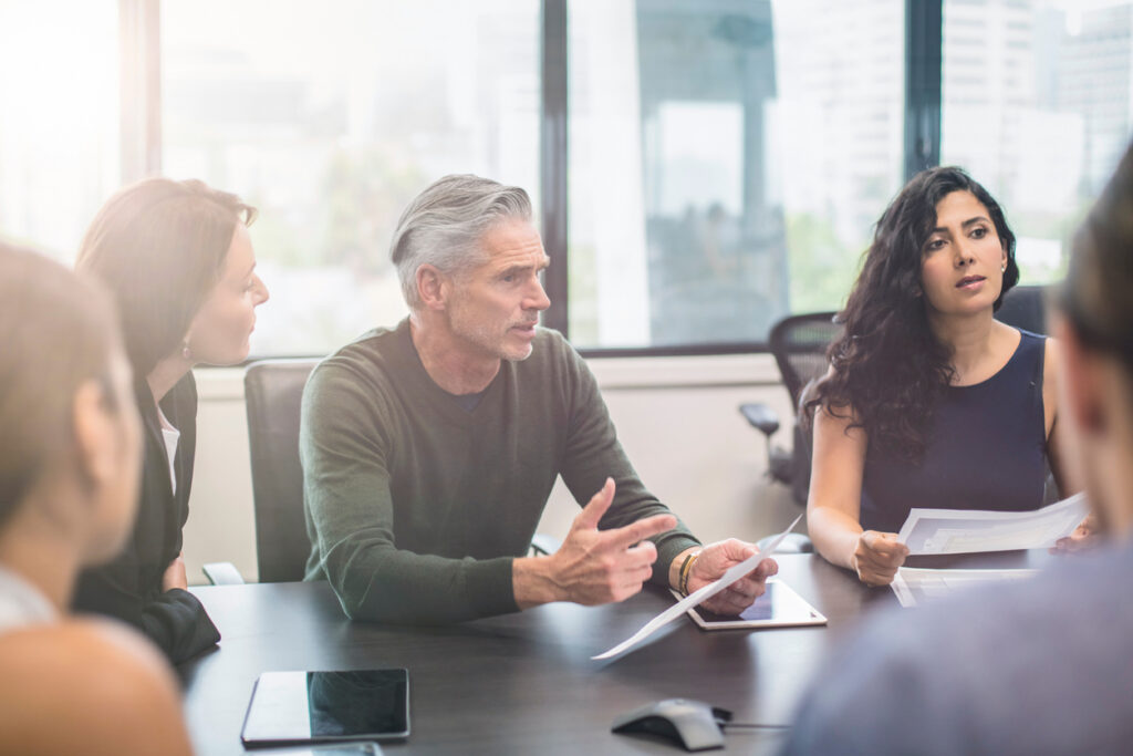 Family meeting with lawyer to choose executor for estate planning in NSW