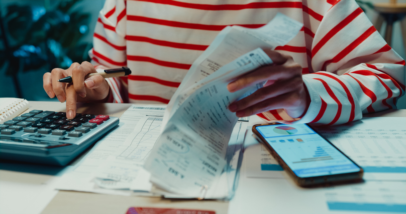 Individual preparing financial documents for property settlement in NSW