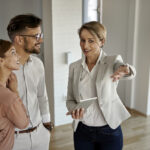 Property buyers reviewing strata report before purchasing an apartment in Newcastle NSW