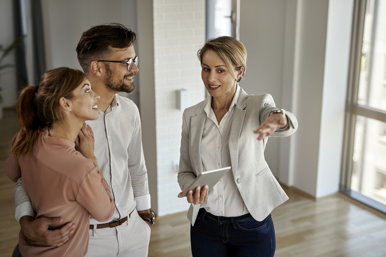 Property buyers reviewing strata report before purchasing an apartment in Newcastle NSW