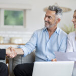 Couple reviewing estate plan with lawyer after significant life changes in NSW
