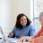 Family discussing enduring guardianship and estate planning documents with lawyer in NSW